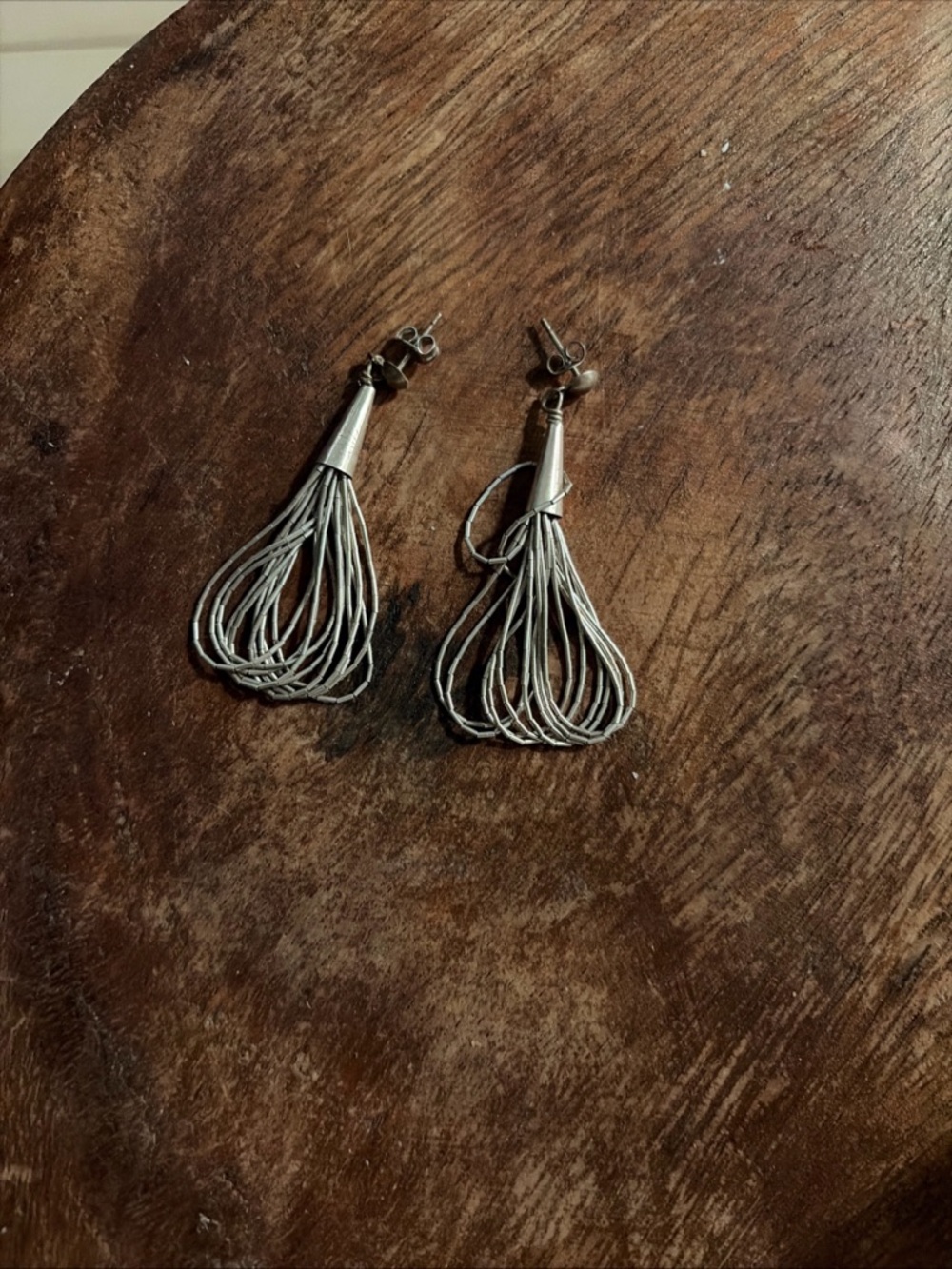NAVAJO STERLING liquid silver drop earrings marked sterling